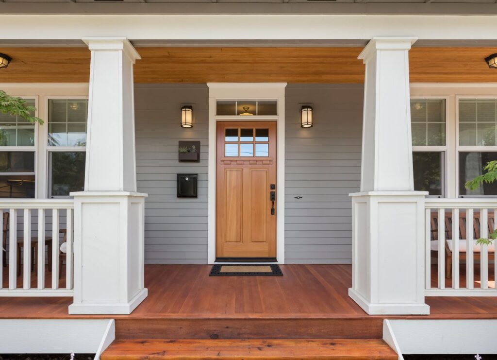 Covered porch and front door of beautiful new home