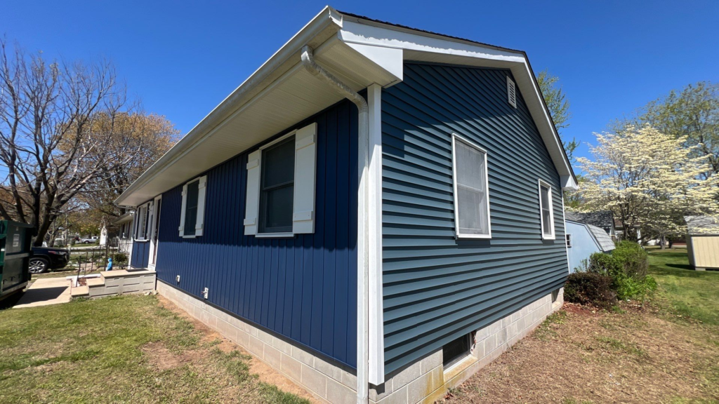Newly installed blue siding