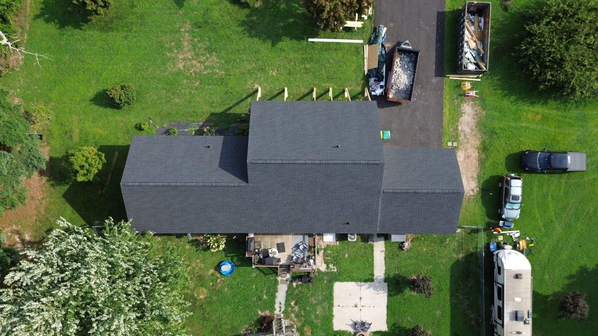 Aerial view of a dark grey shingle roof