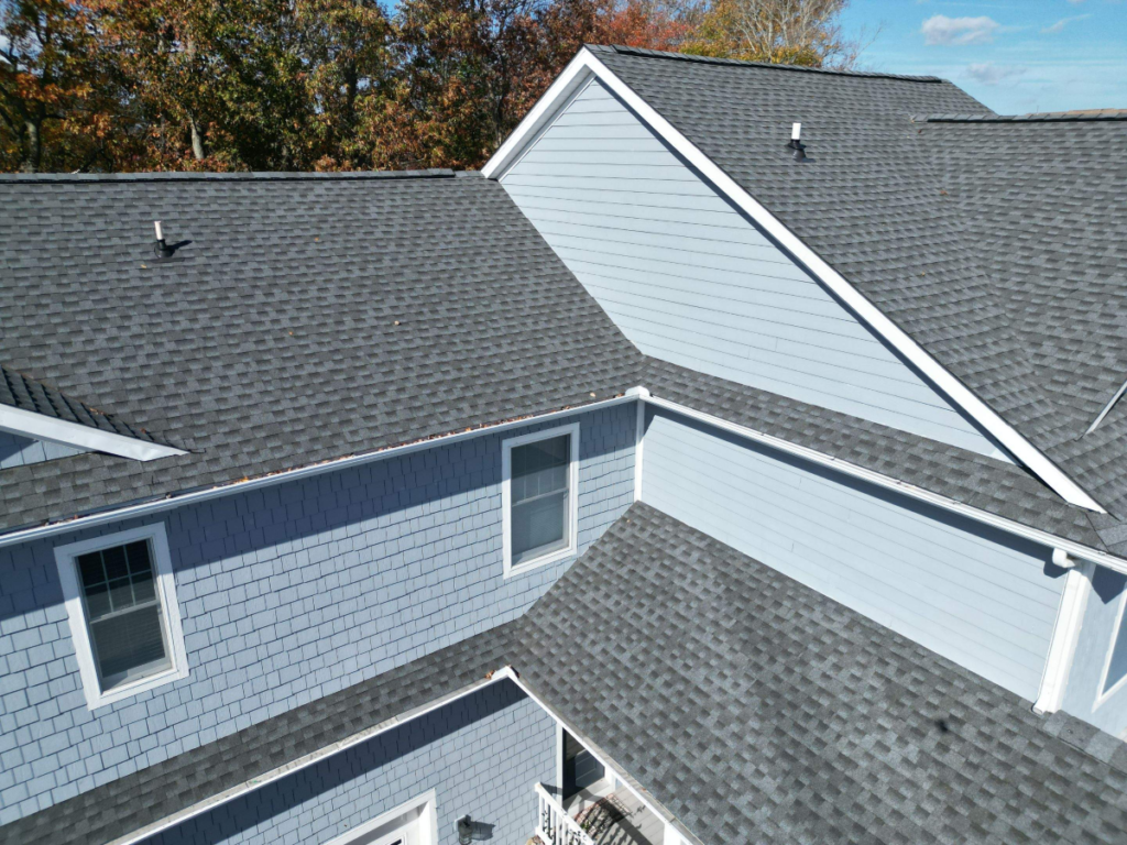 A newly replaced roof with new shingles