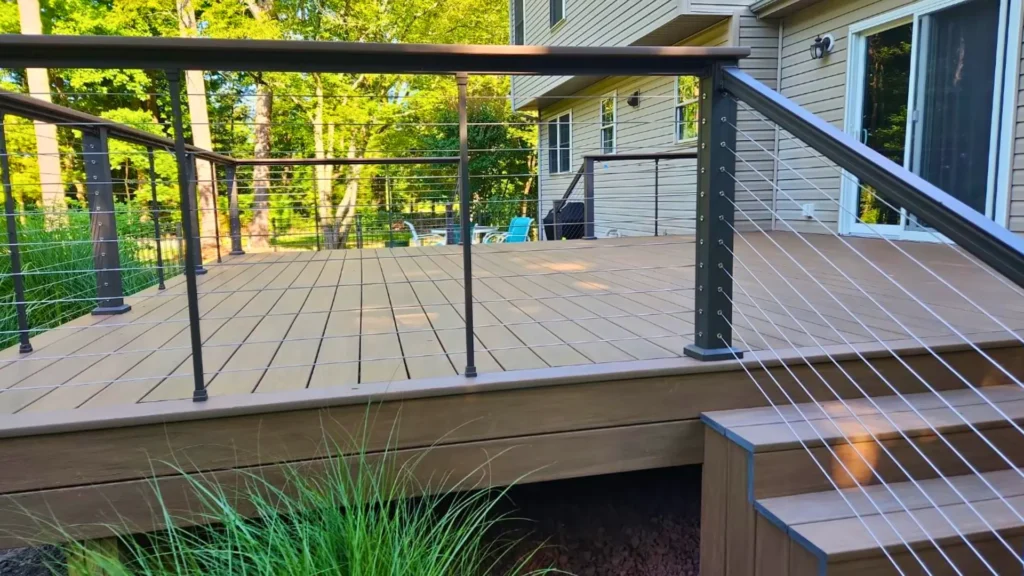 composite deck with modern cable railing detail installed in southern delaware by pro exteriors
