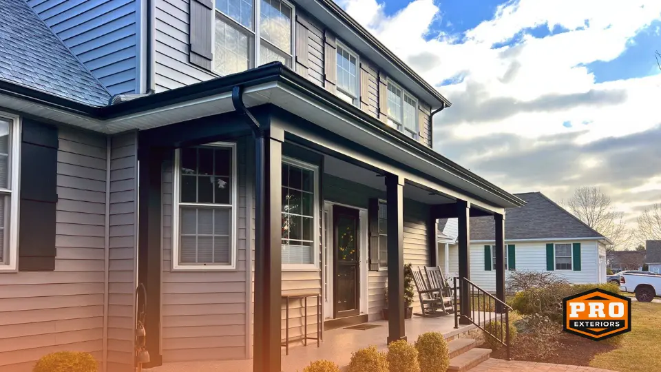 image of black aluminum seamless gutters and downspouts installed by the professionals at pro exteriors in rehoboth beach delaware